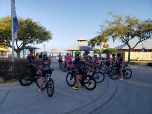 triathletes getting ready to ride 